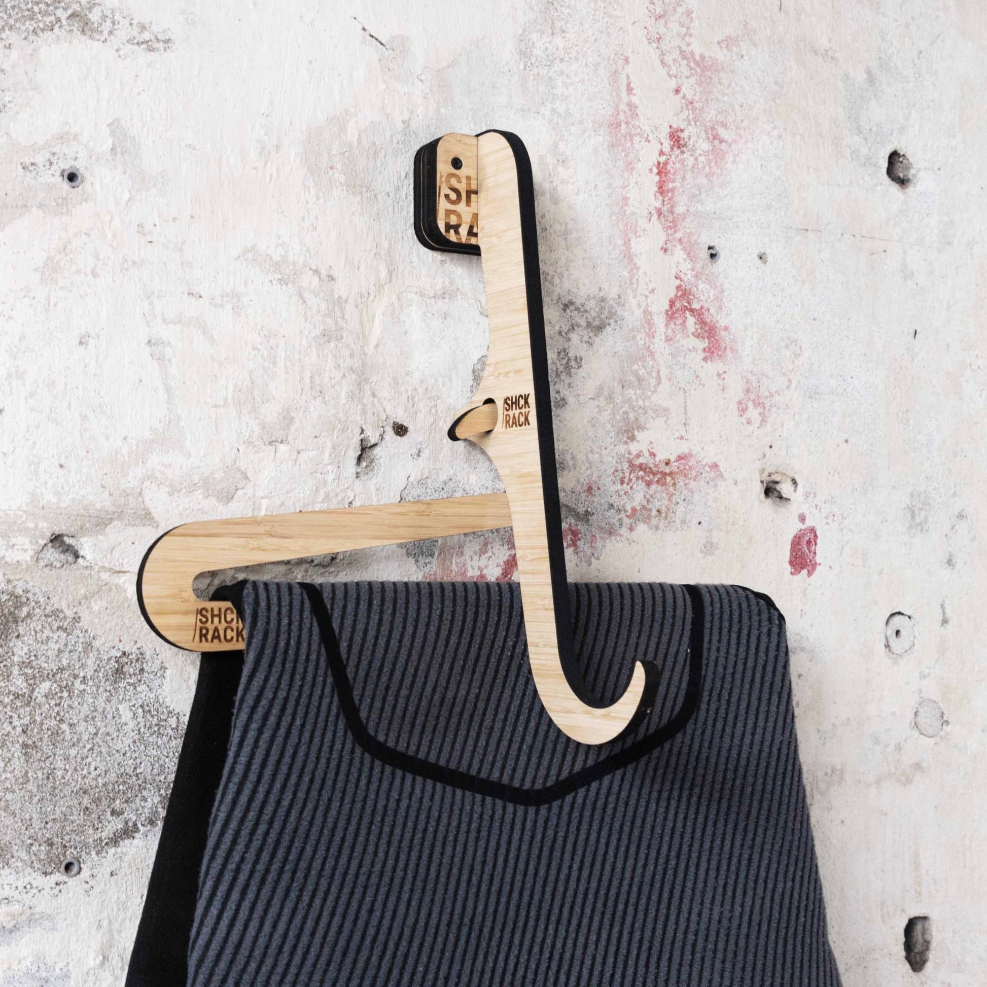 SHCK RACK The Hanger surfboard wetsuit hanger with wetsuit