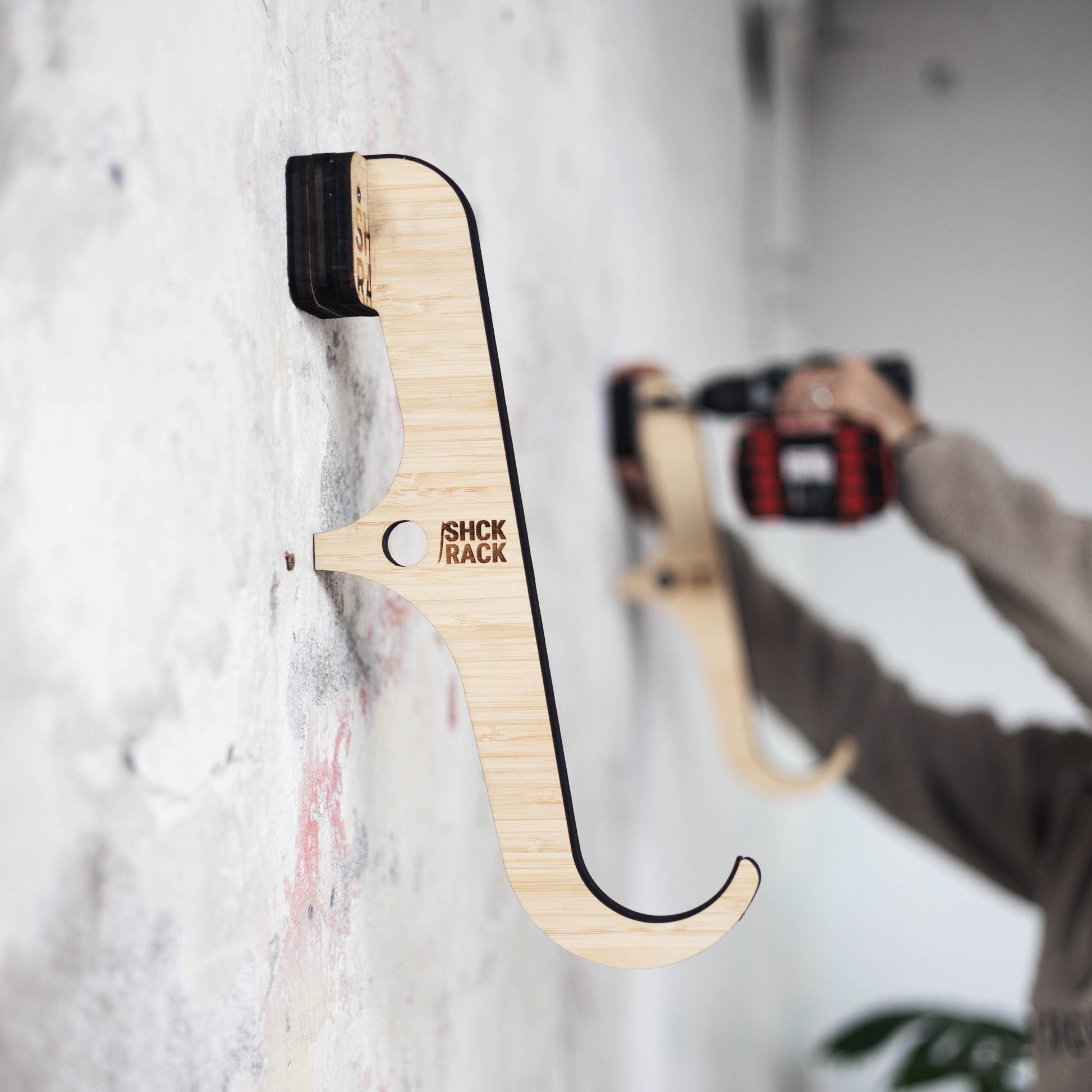 SHCK RACK The Hooks horizontal single surfboard rack installation