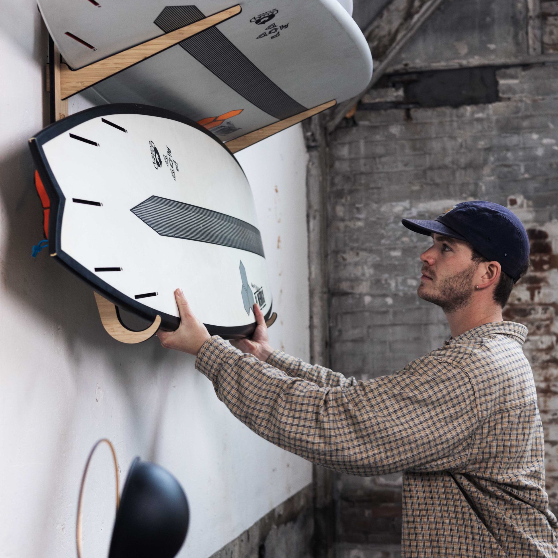 SHCK RACK additional hooks modular system surfboard rack lifestyle shot