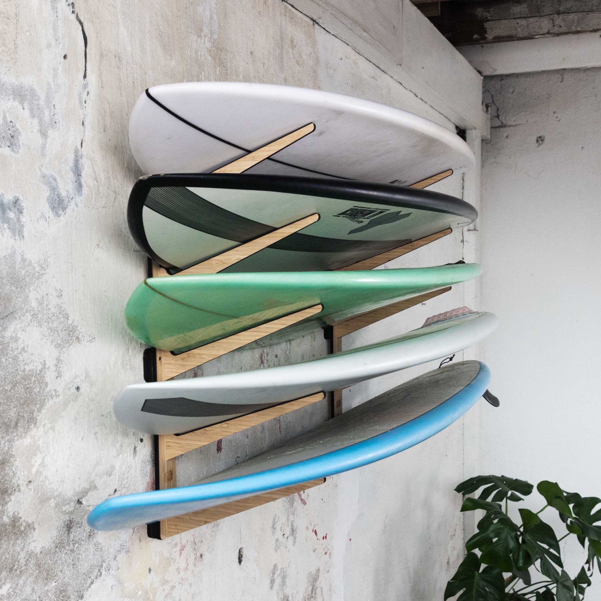 SHCK RACK The Stacker horizontal multi 5 surfboard rack with boards side view